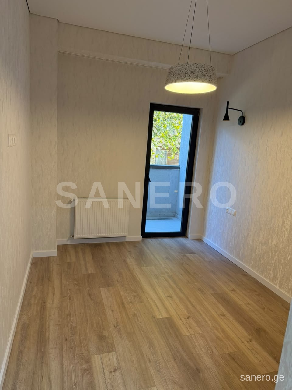 Bedroom with balcony door
