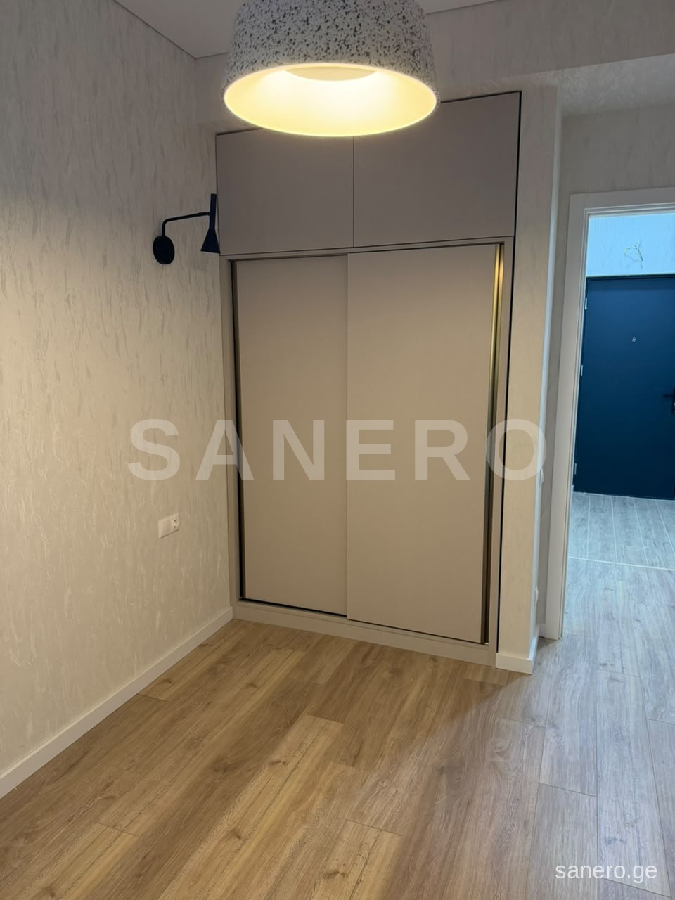 Bedroom with built-in wardrobe