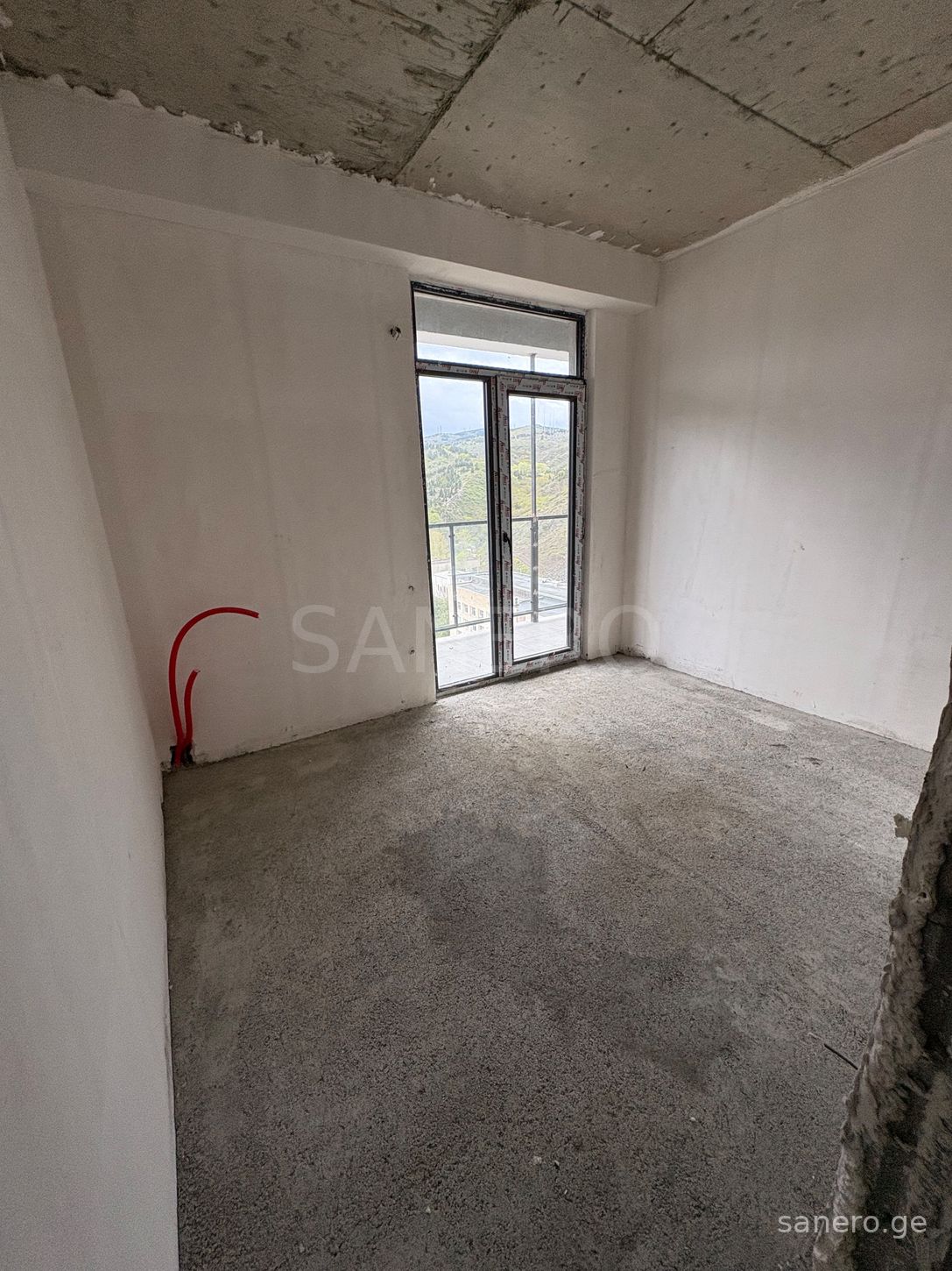 Unfinished room with windows