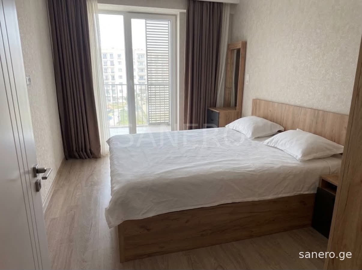 Bedroom with balcony access