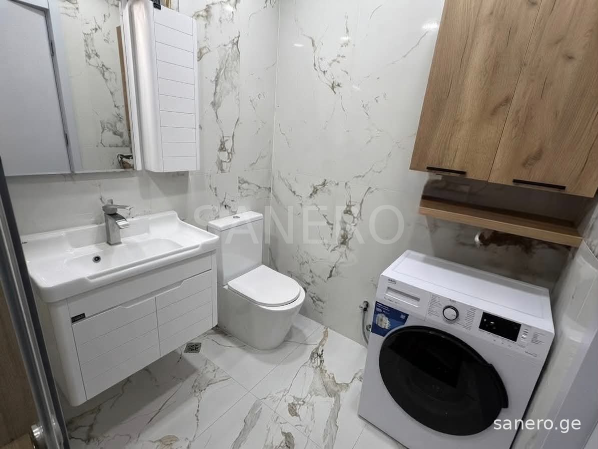Bathroom with washing machine