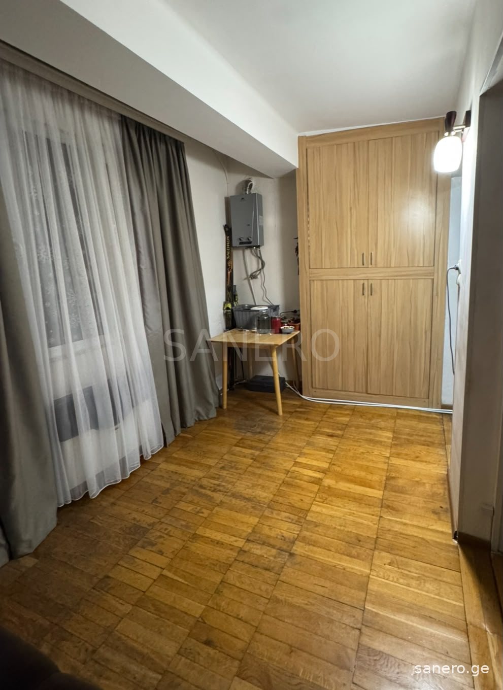 Room with cabinet and window
