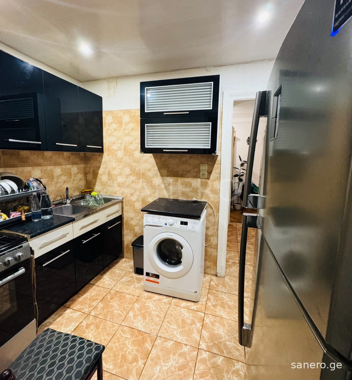 Kitchen with dark cabinets