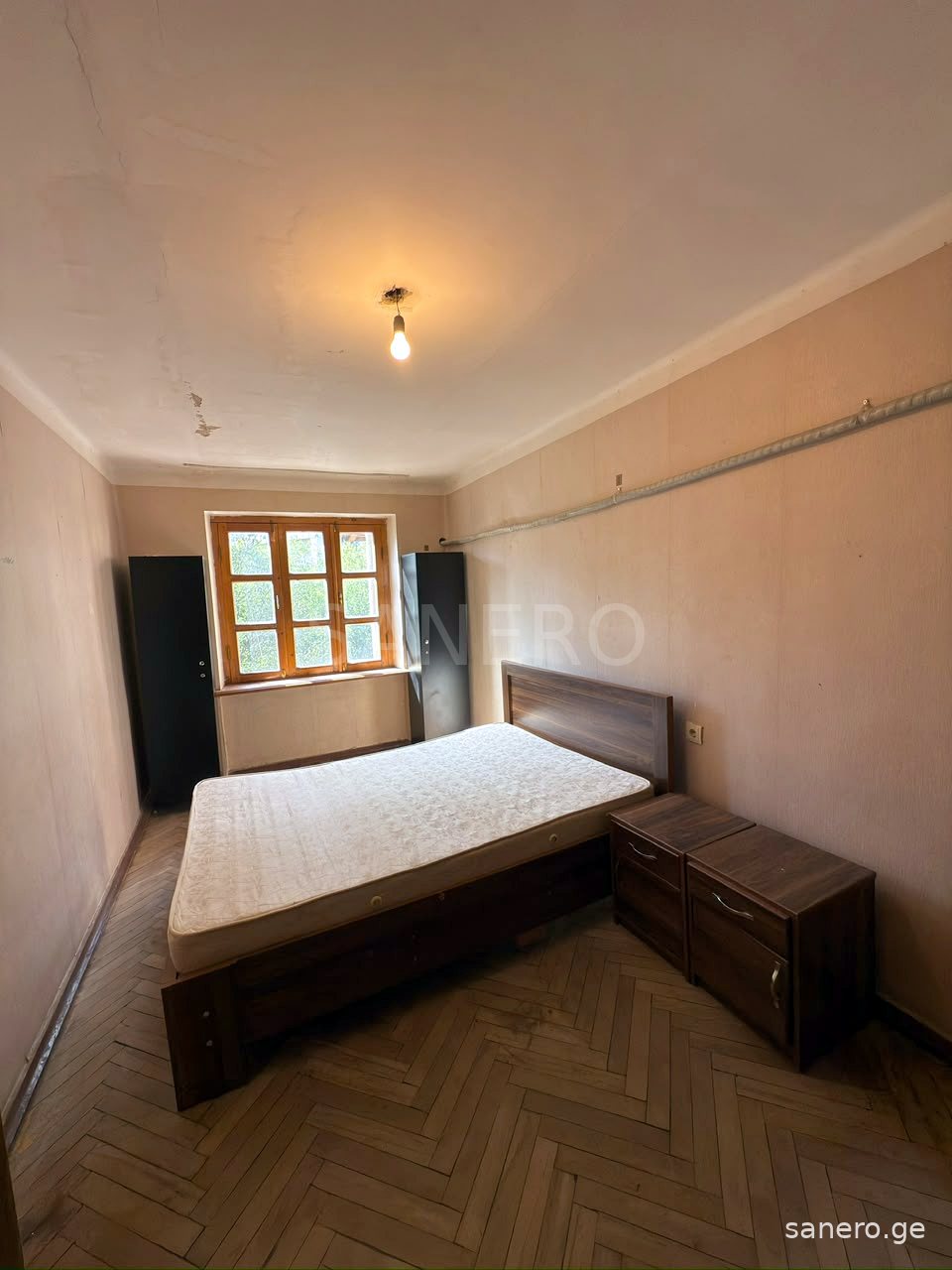 Bedroom, view towards the window
