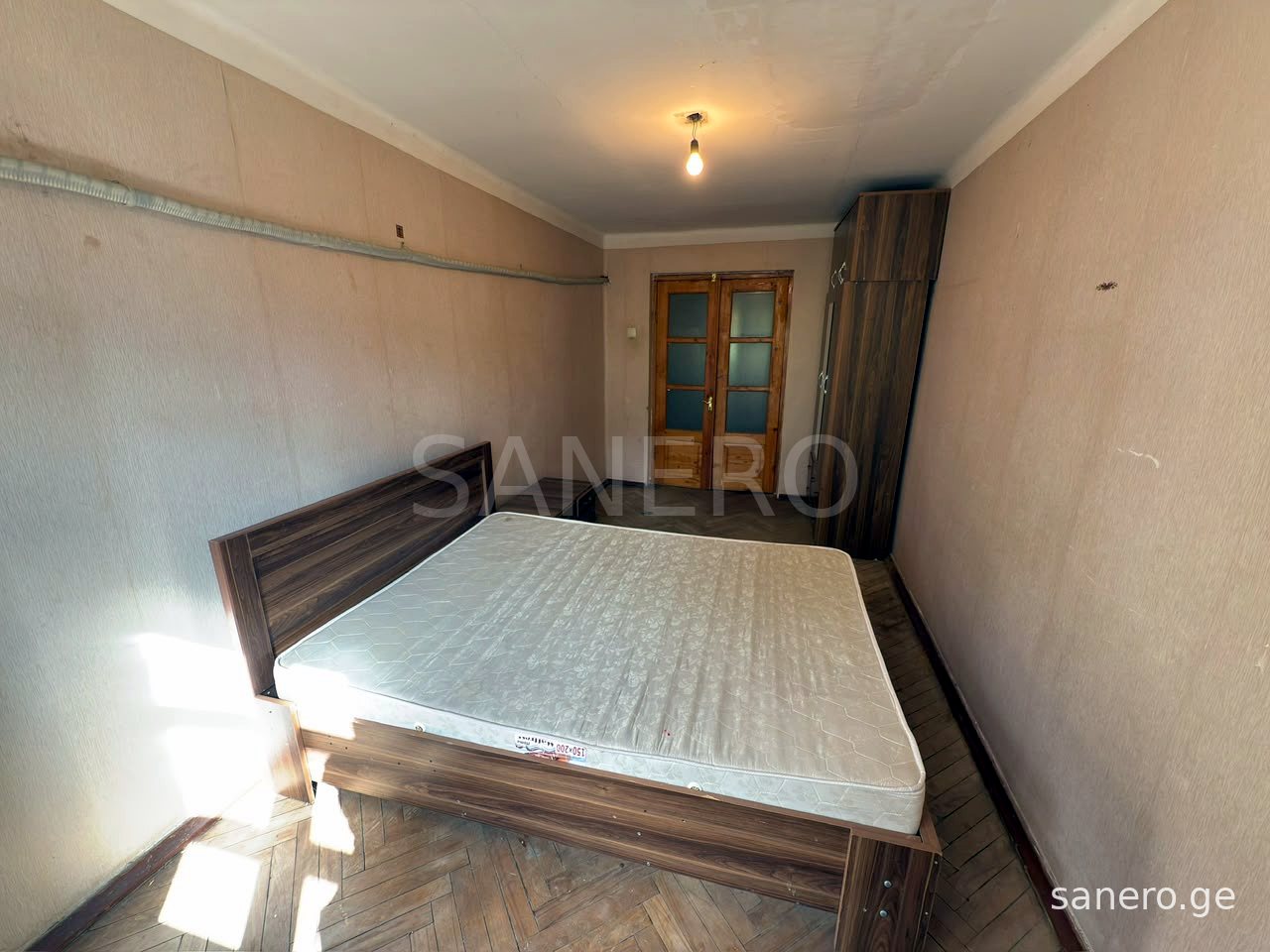 Bedroom, view towards the door