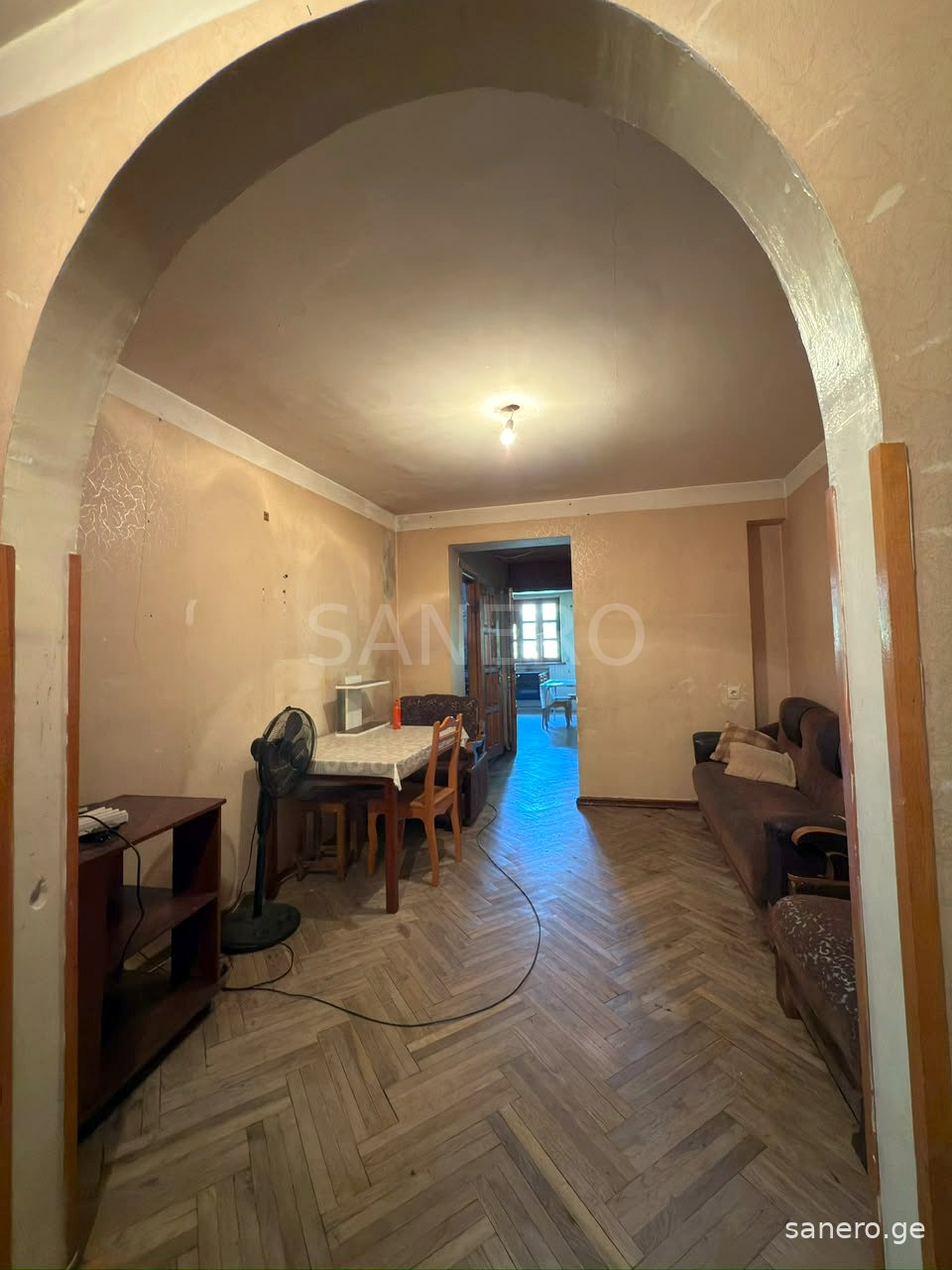 Room behind the arched opening