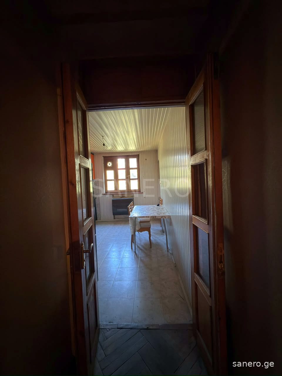 View from the hallway towards the kitchen