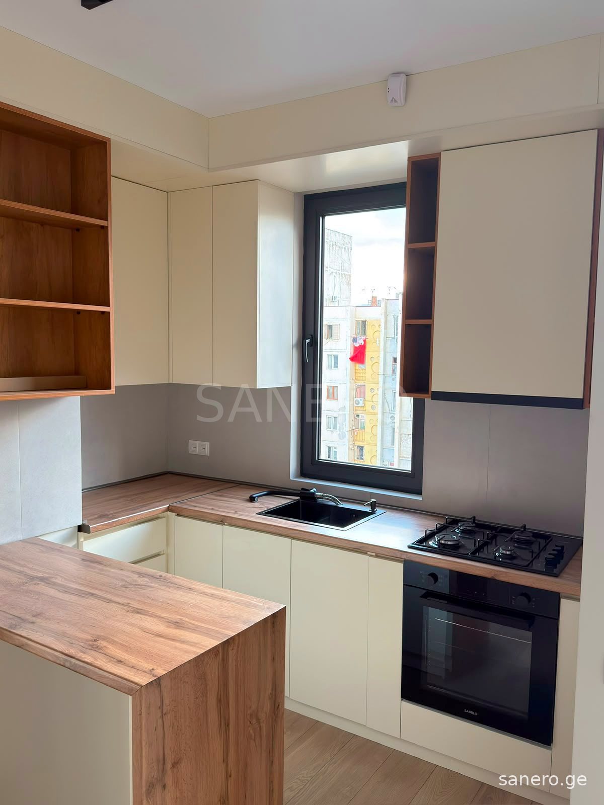 Kitchen with oven and gas cooktop