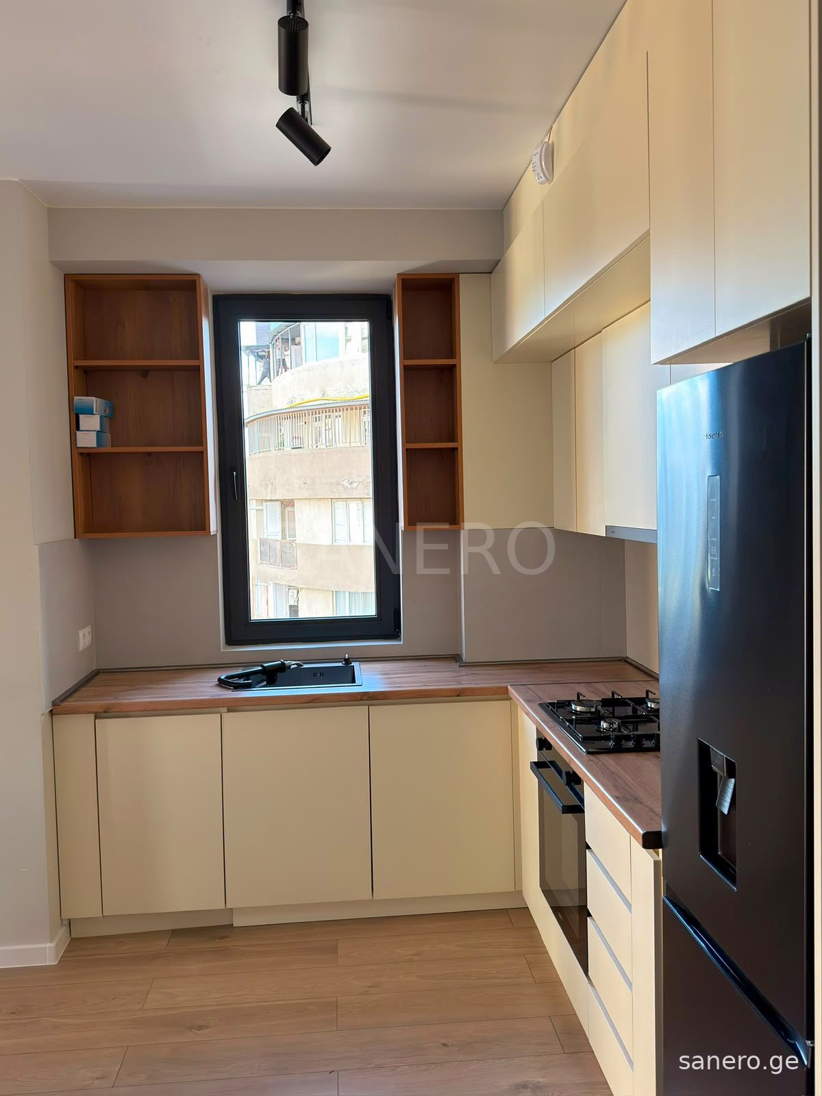 L-shaped kitchen with window