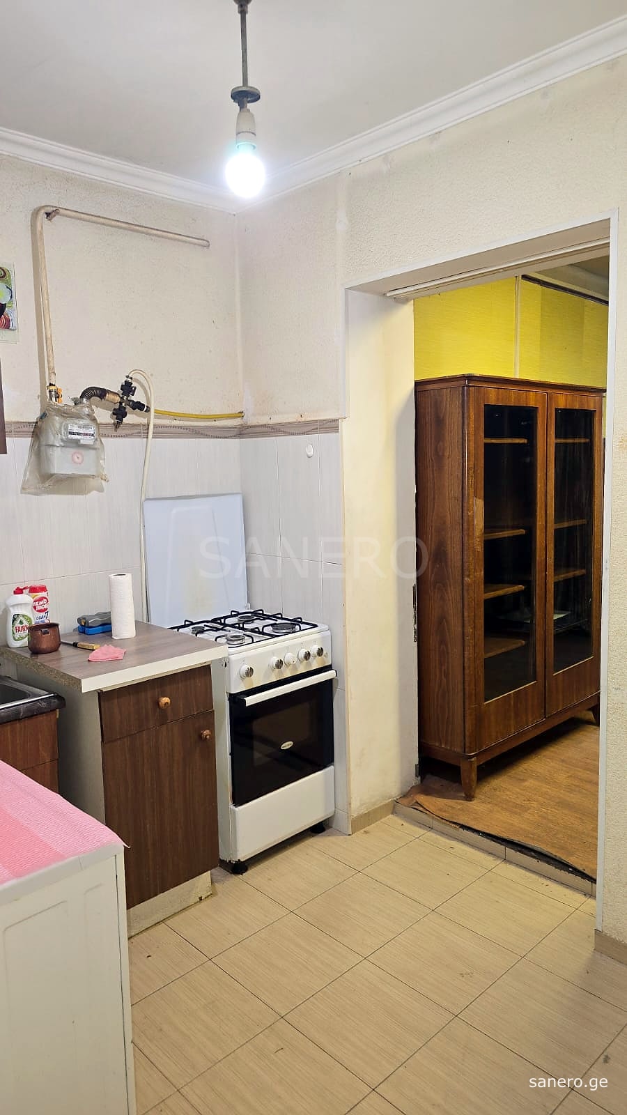 Separate kitchen with gas stove