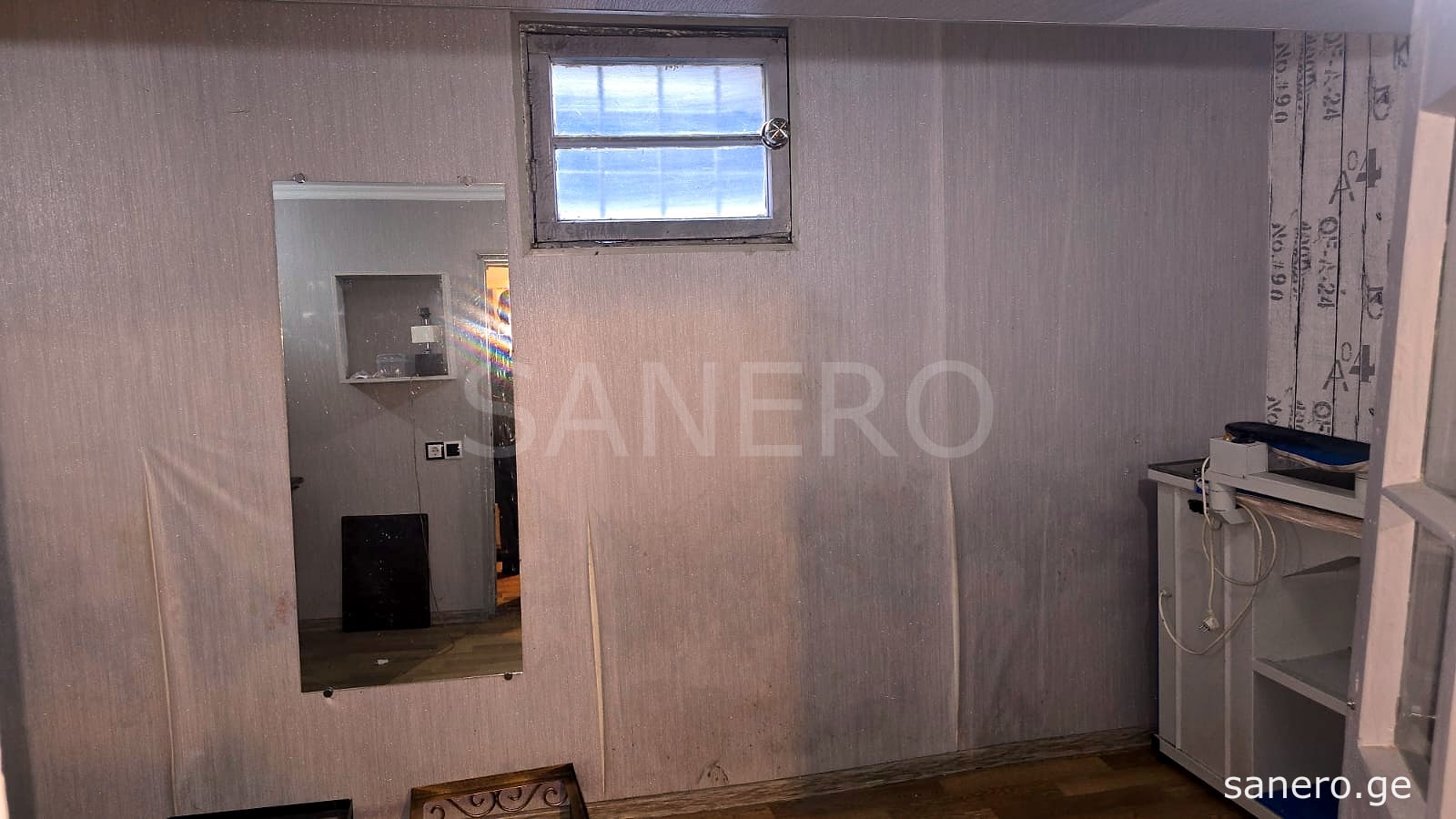 Semi-basement window