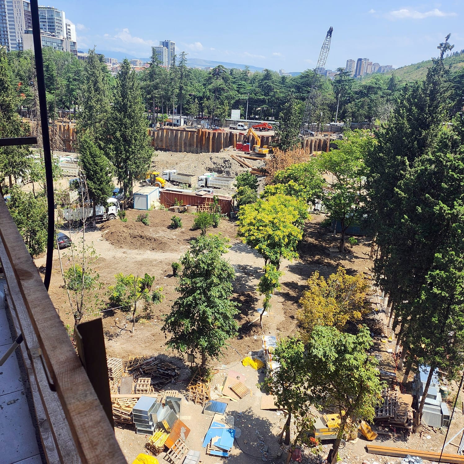 View from the balcony over the green courtyard